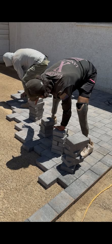 Vaquero X crew laying pavers